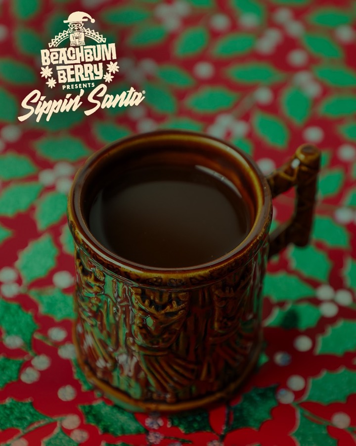 A hot toddy in a Sippin&rsquo; Santa mug.